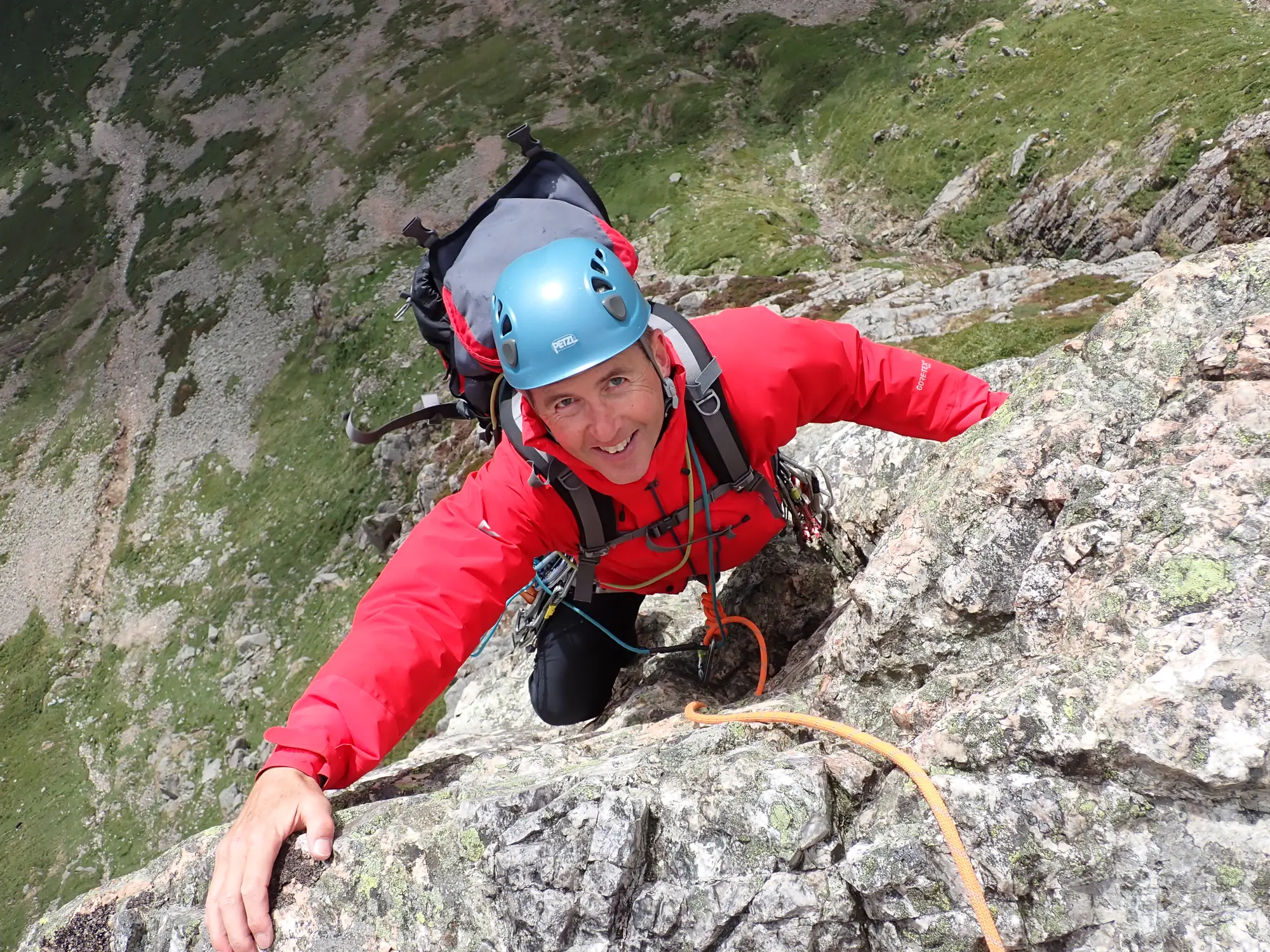 Climber on a steep rock route