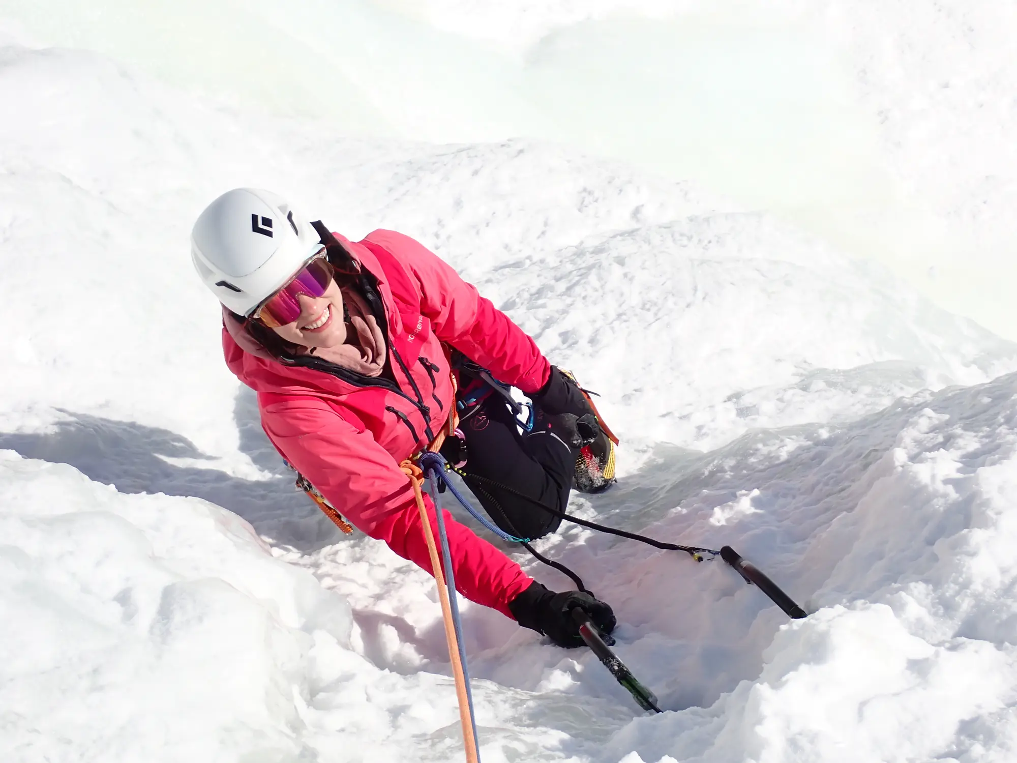 Ice climber on a snow-covered slope
